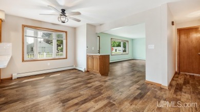 This home has had extreme care and is completely move in ready! on Escanaba Country Club in Michigan - for sale on GolfHomes.com, golf home, golf lot