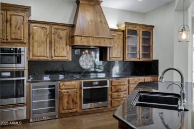 This stunning home sits on a premium lot next to a common area on Encanterra Country Club in Arizona - for sale on GolfHomes.com, golf home, golf lot