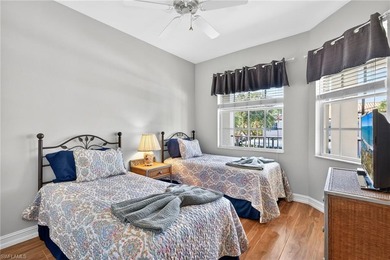 Top-floor 2-bedroom, 2-bath condo located in the heart of the on Pelican Sound Golf and River Club in Florida - for sale on GolfHomes.com, golf home, golf lot