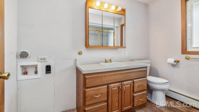 This home has had extreme care and is completely move in ready! on Escanaba Country Club in Michigan - for sale on GolfHomes.com, golf home, golf lot