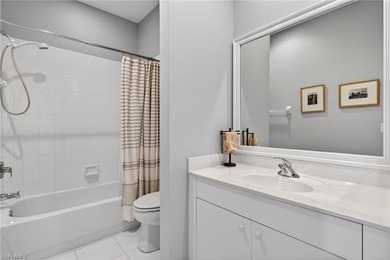 Top-floor 2-bedroom, 2-bath condo located in the heart of the on Pelican Sound Golf and River Club in Florida - for sale on GolfHomes.com, golf home, golf lot