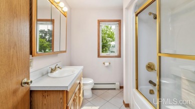 This home has had extreme care and is completely move in ready! on Escanaba Country Club in Michigan - for sale on GolfHomes.com, golf home, golf lot