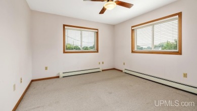 This home has had extreme care and is completely move in ready! on Escanaba Country Club in Michigan - for sale on GolfHomes.com, golf home, golf lot