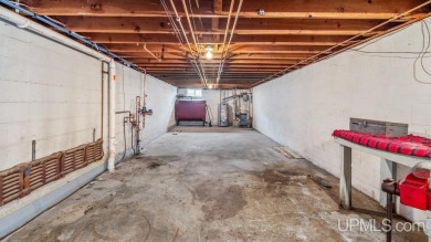 This home has had extreme care and is completely move in ready! on Escanaba Country Club in Michigan - for sale on GolfHomes.com, golf home, golf lot