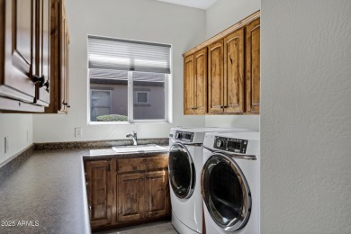 This stunning home sits on a premium lot next to a common area on Encanterra Country Club in Arizona - for sale on GolfHomes.com, golf home, golf lot