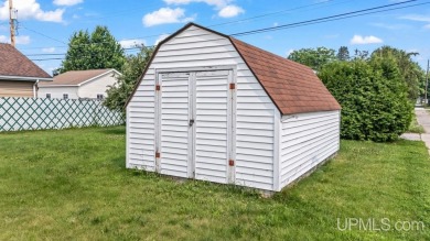 This home has had extreme care and is completely move in ready! on Escanaba Country Club in Michigan - for sale on GolfHomes.com, golf home, golf lot