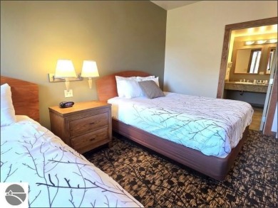 If you're searching for a base camp with stunning views and on  in Michigan - for sale on GolfHomes.com, golf home, golf lot