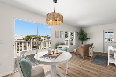 Show stopper! This totally remodeled rare 3 bedroom/2 bath on Mangrove Bay Golf Course in Florida - for sale on GolfHomes.com, golf home, golf lot