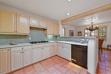 Quail Run's perfect condo - a classic Pinon C floorplan with two on Quail Run Golf Course in New Mexico - for sale on GolfHomes.com, golf home, golf lot