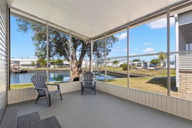 Show stopper! This totally remodeled rare 3 bedroom/2 bath on Mangrove Bay Golf Course in Florida - for sale on GolfHomes.com, golf home, golf lot