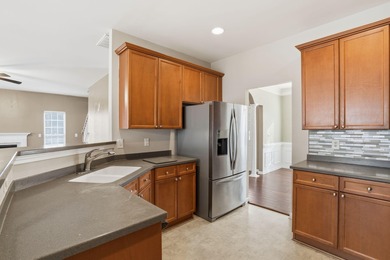 Priced to sell and full of potential, this 5-bedroom, 3-bath on Golf Club At Wescott Plantation in South Carolina - for sale on GolfHomes.com, golf home, golf lot