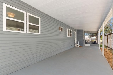 Show stopper! This totally remodeled rare 3 bedroom/2 bath on Mangrove Bay Golf Course in Florida - for sale on GolfHomes.com, golf home, golf lot