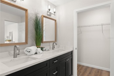 Show stopper! This totally remodeled rare 3 bedroom/2 bath on Mangrove Bay Golf Course in Florida - for sale on GolfHomes.com, golf home, golf lot