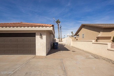 Ideally located just minutes from the golf course, this on London Bridge Golf Course in Arizona - for sale on GolfHomes.com, golf home, golf lot