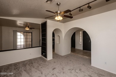 Ideally located just minutes from the golf course, this on London Bridge Golf Course in Arizona - for sale on GolfHomes.com, golf home, golf lot