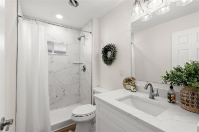 Show stopper! This totally remodeled rare 3 bedroom/2 bath on Mangrove Bay Golf Course in Florida - for sale on GolfHomes.com, golf home, golf lot