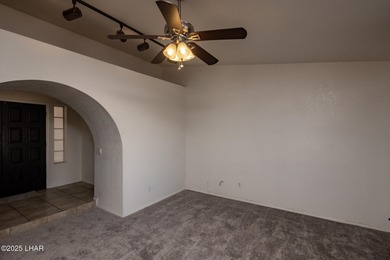 Ideally located just minutes from the golf course, this on London Bridge Golf Course in Arizona - for sale on GolfHomes.com, golf home, golf lot