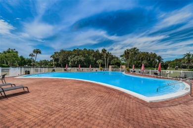 Under contract-accepting backup offers. This beautifully on Seven Springs Golf and Country Club in Florida - for sale on GolfHomes.com, golf home, golf lot