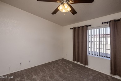 Ideally located just minutes from the golf course, this on London Bridge Golf Course in Arizona - for sale on GolfHomes.com, golf home, golf lot