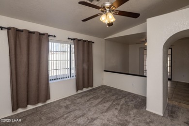 Ideally located just minutes from the golf course, this on London Bridge Golf Course in Arizona - for sale on GolfHomes.com, golf home, golf lot