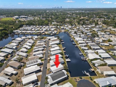 Show stopper! This totally remodeled rare 3 bedroom/2 bath on Mangrove Bay Golf Course in Florida - for sale on GolfHomes.com, golf home, golf lot