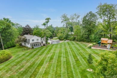 Welcome to 26 Country Club, a Stunning Dutch Colonial nestled on Beekman Country Club in New York - for sale on GolfHomes.com, golf home, golf lot