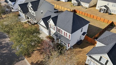 Priced to sell and full of potential, this 5-bedroom, 3-bath on Golf Club At Wescott Plantation in South Carolina - for sale on GolfHomes.com, golf home, golf lot