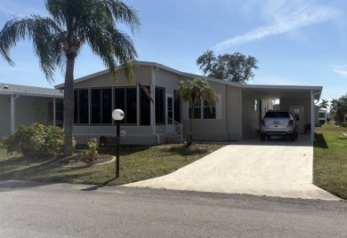 Welcome to this beautifully updated 2-bedroom, 2-bathroom home on Sabal Springs Golf and Racquet Club in Florida - for sale on GolfHomes.com, golf home, golf lot