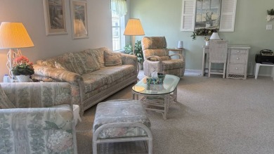 Welcome to this beautifully updated 2-bedroom, 2-bathroom home on Sabal Springs Golf and Racquet Club in Florida - for sale on GolfHomes.com, golf home, golf lot