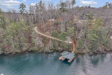 Waterfront living at its finest. Wake each morning to panoramic on The Cliffs At Keowee Falls in South Carolina - for sale on GolfHomes.com, golf home, golf lot