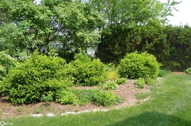 Exquisite mid-century home, just one block from the Ottumwa Golf on Ottumwa Country Club in Iowa - for sale on GolfHomes.com, golf home, golf lot