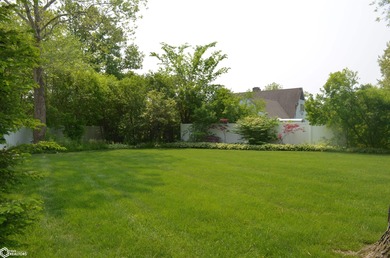 Exquisite mid-century home, just one block from the Ottumwa Golf on Ottumwa Country Club in Iowa - for sale on GolfHomes.com, golf home, golf lot