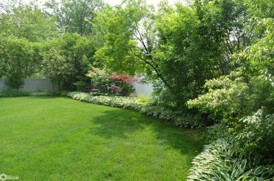 Exquisite mid-century home, just one block from the Ottumwa Golf on Ottumwa Country Club in Iowa - for sale on GolfHomes.com, golf home, golf lot