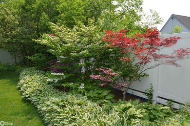 Exquisite mid-century home, just one block from the Ottumwa Golf on Ottumwa Country Club in Iowa - for sale on GolfHomes.com, golf home, golf lot