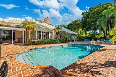 Elegant brick ranch-style estate sits on a meticulously on Country Club of Florida in Florida - for sale on GolfHomes.com, golf home, golf lot