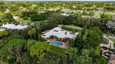 Elegant brick ranch-style estate sits on a meticulously on Country Club of Florida in Florida - for sale on GolfHomes.com, golf home, golf lot