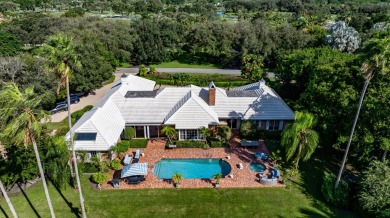 Elegant brick ranch-style estate sits on a meticulously on Country Club of Florida in Florida - for sale on GolfHomes.com, golf home, golf lot