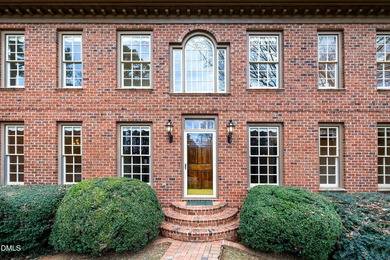 Stately all-brick home located in the sought-after Estates on North Ridge Country Club in North Carolina - for sale on GolfHomes.com, golf home, golf lot