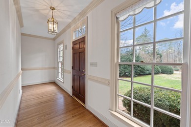 Stately all-brick home located in the sought-after Estates on North Ridge Country Club in North Carolina - for sale on GolfHomes.com, golf home, golf lot