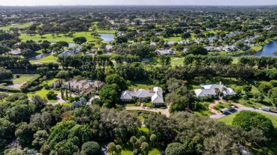 Elegant brick ranch-style estate sits on a meticulously on Country Club of Florida in Florida - for sale on GolfHomes.com, golf home, golf lot