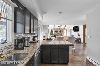 Beautiful contemporary mountain home offering 3 bedrooms, 2 full on Split Rock Resort and Country Club in Pennsylvania - for sale on GolfHomes.com, golf home, golf lot