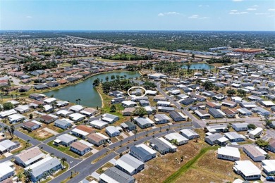 Welcome to this 3-bedroom, 2-bath fully furnished turnkey mobile on Kings Gate Golf Club in Florida - for sale on GolfHomes.com, golf home, golf lot
