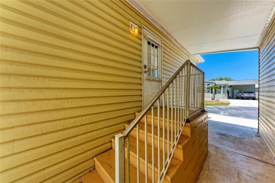 Welcome to this 3-bedroom, 2-bath fully furnished turnkey mobile on Kings Gate Golf Club in Florida - for sale on GolfHomes.com, golf home, golf lot