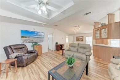 Welcome to this 3-bedroom, 2-bath fully furnished turnkey mobile on Kings Gate Golf Club in Florida - for sale on GolfHomes.com, golf home, golf lot