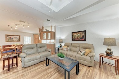 Welcome to this 3-bedroom, 2-bath fully furnished turnkey mobile on Kings Gate Golf Club in Florida - for sale on GolfHomes.com, golf home, golf lot
