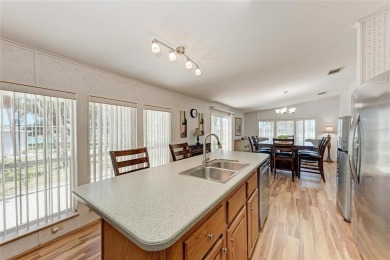 Welcome to this 3-bedroom, 2-bath fully furnished turnkey mobile on Kings Gate Golf Club in Florida - for sale on GolfHomes.com, golf home, golf lot