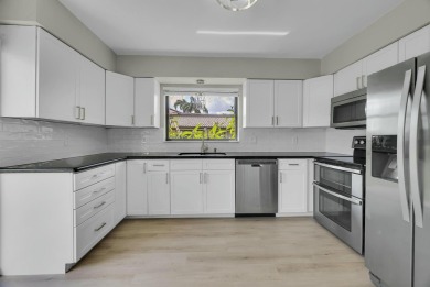 Don't miss this beautifully renovated, single-story corner on Martin Downs Country Club in Florida - for sale on GolfHomes.com, golf home, golf lot