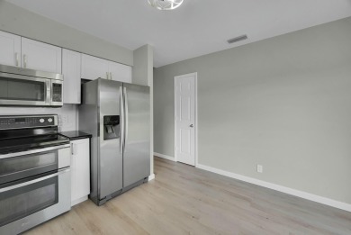 Don't miss this beautifully renovated, single-story corner on Martin Downs Country Club in Florida - for sale on GolfHomes.com, golf home, golf lot