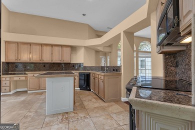 Tucked within the heart of Peachtree City's beloved Kenton Place on Braelinn Golf Club in Georgia - for sale on GolfHomes.com, golf home, golf lot