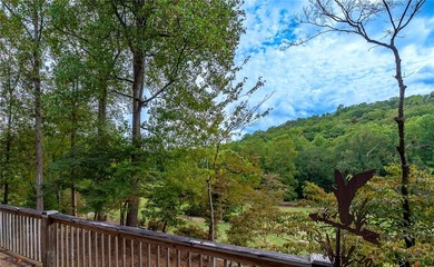 Step into serenity at 2111 Moorefield Memorial Highway, where on The Rock At Jocassee in South Carolina - for sale on GolfHomes.com, golf home, golf lot